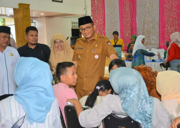 Baznas Kota Padang Serahkan Bantuan Bagi Korban Kebakaran 