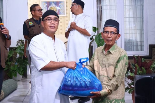 Pramuka Payakumbuh Salurkan 70 Paket Sembako untuk Warga dan Anak Tahfidz Jelang Idul Fitri 1447 H